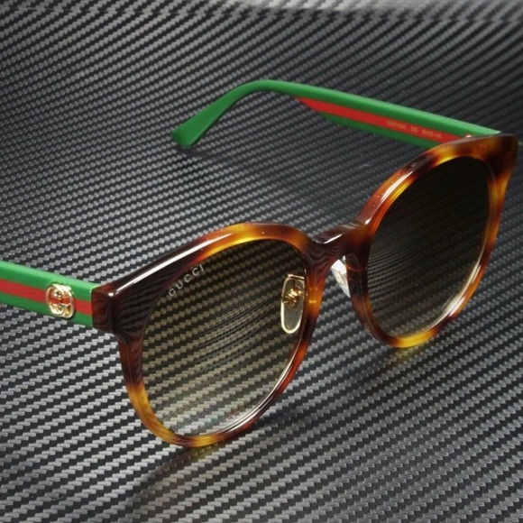 Gucci 55mm Havana Sunglasses in tortoise/classic Gucci stripes. - Picture 2 of 3
